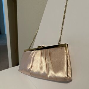 Elegant Cream Clutch with Gold Chain